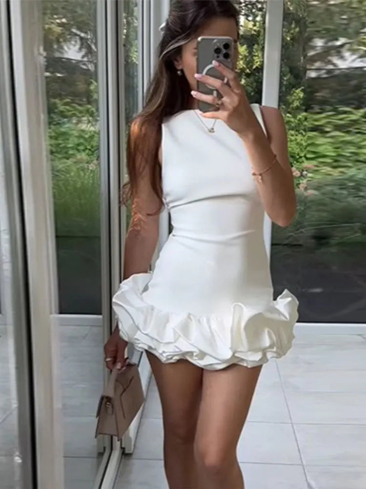 Elegant White Pleated Dress with Ruffles