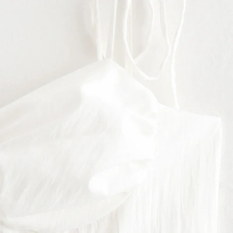 Women's Ruffled White Dress - Backless Luxury